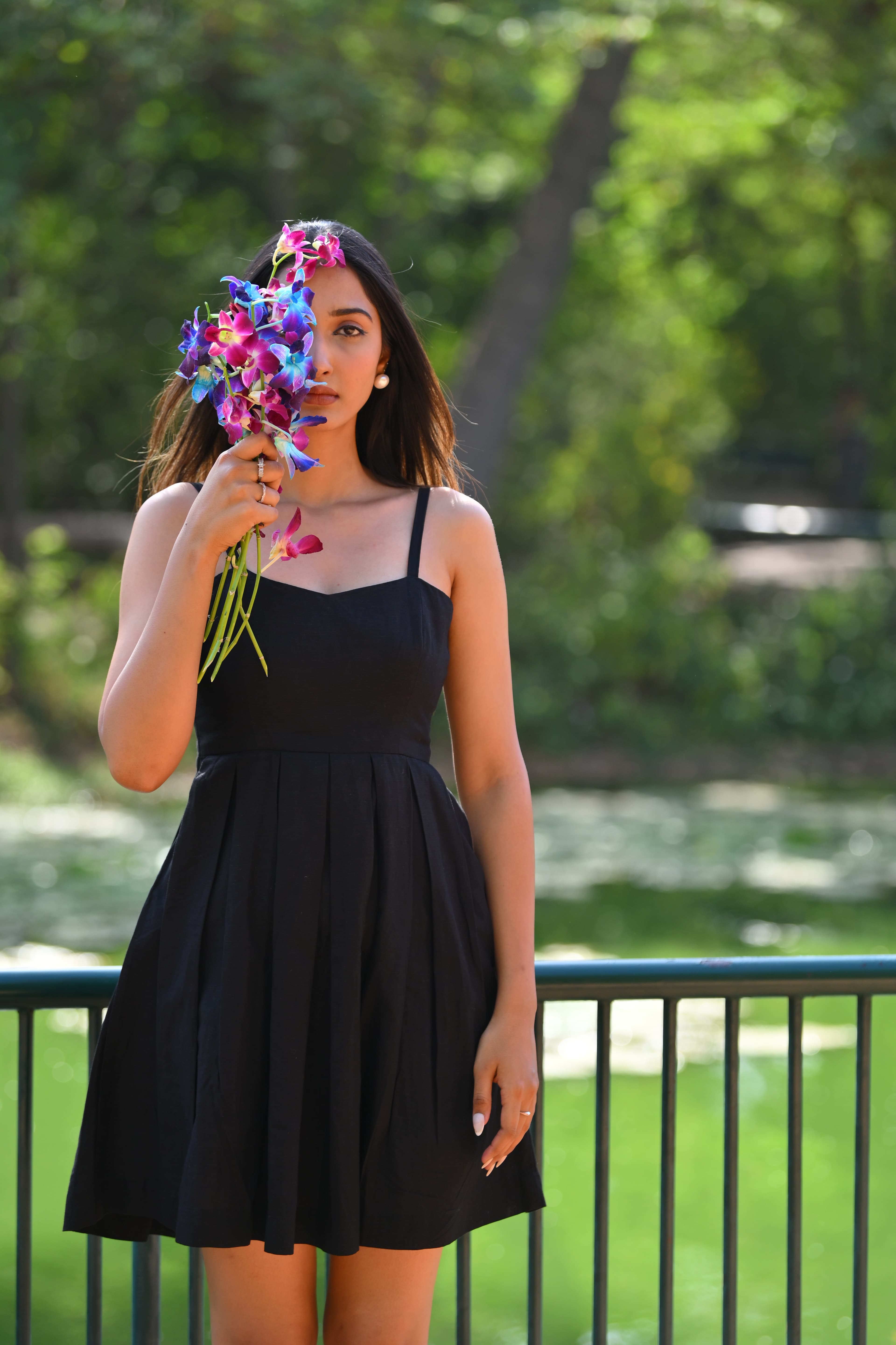 Merle Mini Dress in Black — a flattering fit-and-flare silhouette